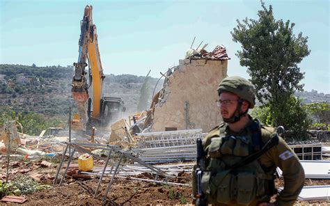 Israeli troops prep West Bank home of Palestinian gunman for demolition following attack in Tel Aviv